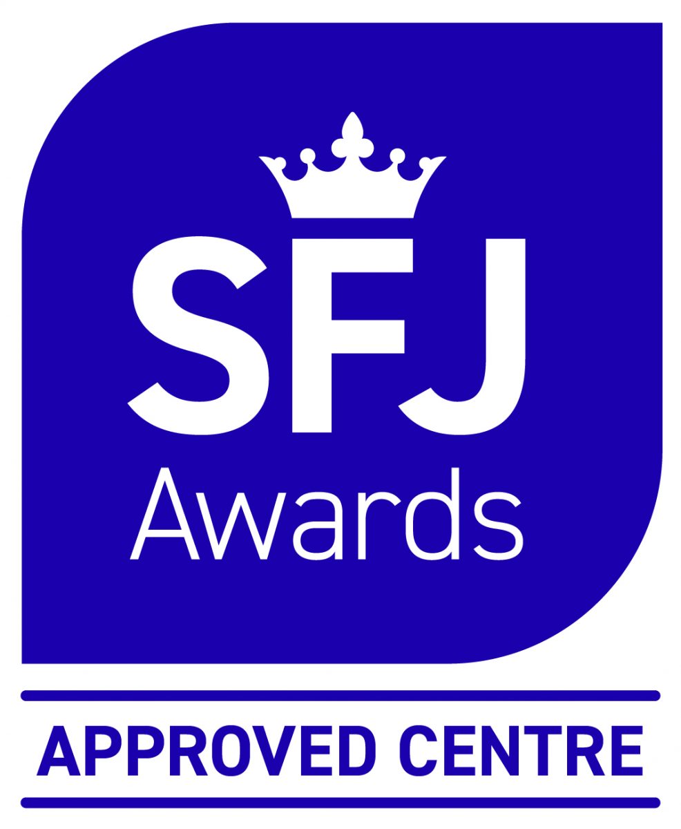 Blue rounded-square badge with a white crown over large 'SFJ' and the word 'Awards'; below it the text 'APPROVED CENTRE' with horizontal lines above and below.